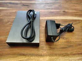 Externe Festplatte mit USB Kabel und Netzteil