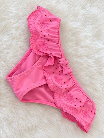 Bas de bikini rose avec volants comme neuf taille 110/116