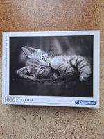 Herziges Puzzle Katze Schwarz-weiss 