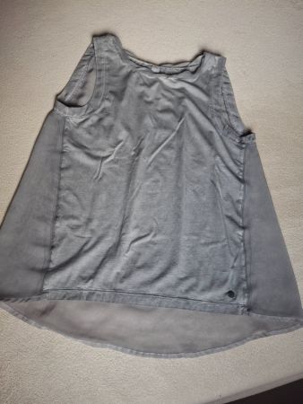 Haut gris arrière tout en transparence 36 marque S. Oliver