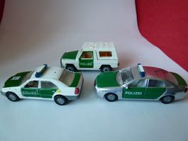 ab  5.--- SIKU - 3 Polizei Modelle - zT bespielt , recht OK
