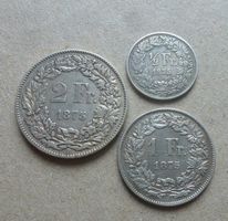 Lot ++ 1/2 Fr., 1.- Fr. und 2.- Fr. 1875, gute Erhaltungen