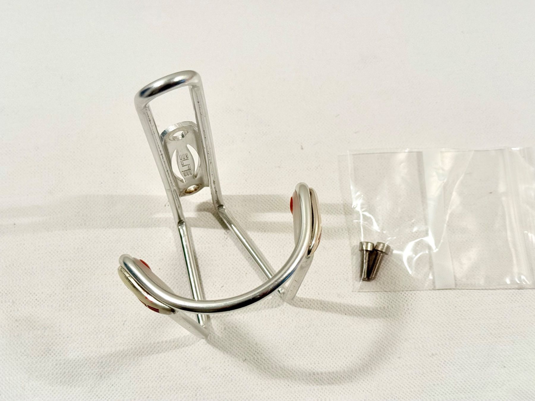 Pièces détachées: ELITE Bottle Cage Flaschenhalter 2606 – D'occasion à Luzern par bikeandbeltcom