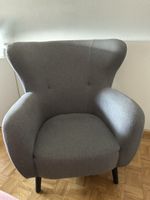 Grauer Sessel