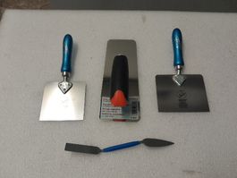 Spachtel und Glätekelle 