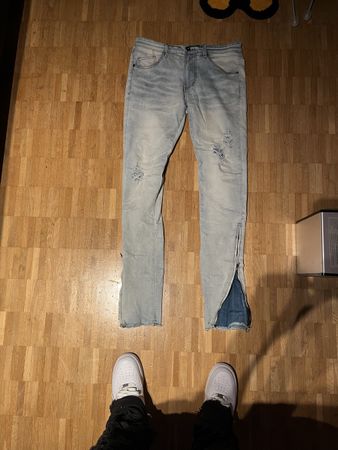 Distressed Denim Jeans with Zipper Detail - EU Size 32