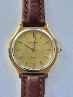 Montre Bucherer Quartz plaque d’or cuir marron femme