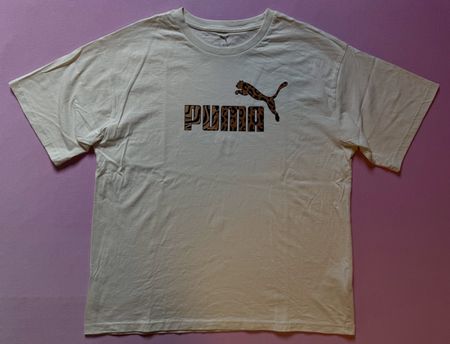 T-shirt PUMA beige avec logo léopard – Taille L – Comme neuf
