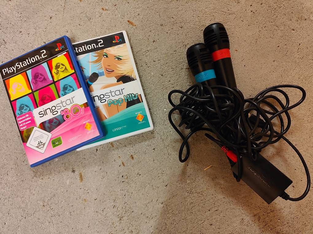 Giochi: PS2/3 Sing Star Mikrofone und 2 Spiele – Usato da Fribourg venduto da nic_7krl