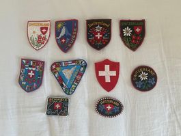 10 X DIVERSE  ABZEICHEN ZUM AUFNÄHEN MIT CH  MOTIVEN