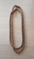Collier tressé long doré Zara