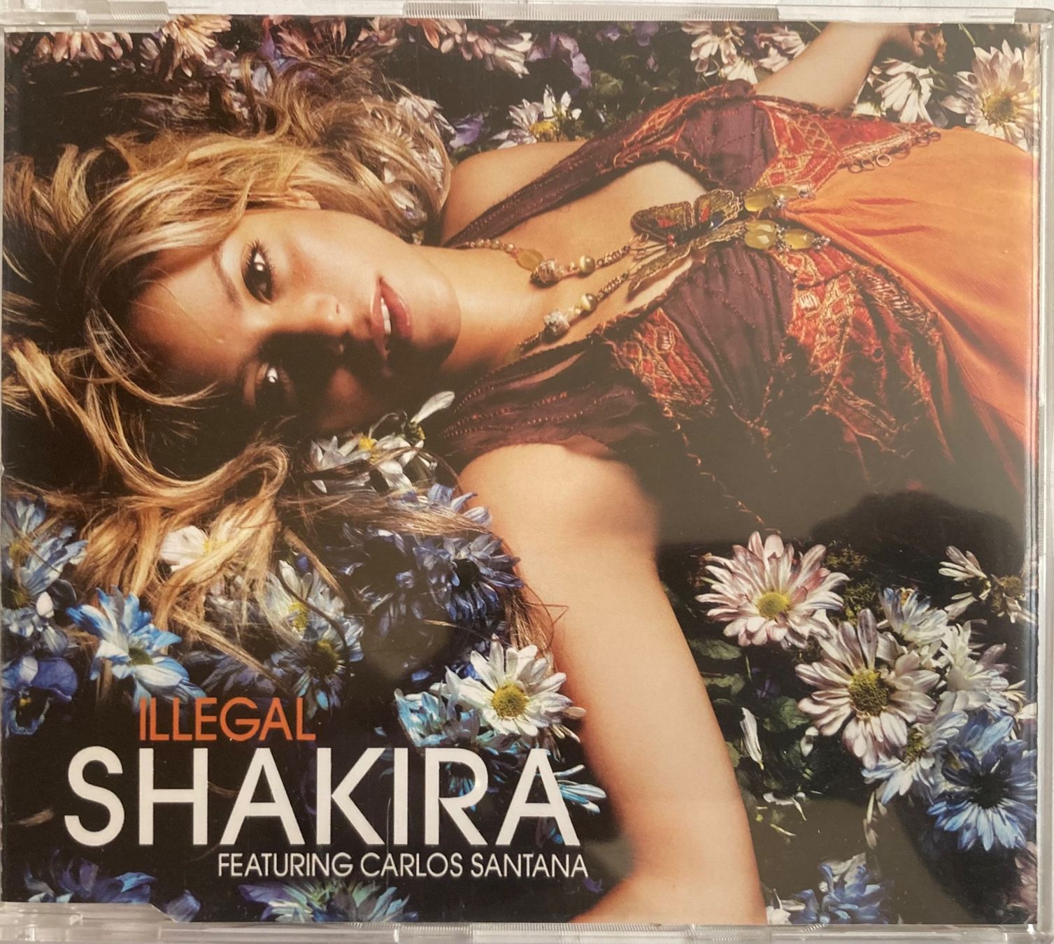 CDs: SHAKIRA - FEATURING CARLOS SANTANA - ILLEGAL – D'occasion à Poliez-Pittet par Newtown-Records