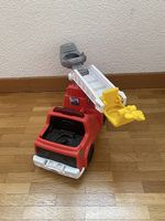Spielzeug Feuerwehrauto blinkt und macht Geräusche
