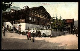 AK Chésières, Straßenpartie mit Wohnhaus und Passanten
