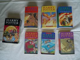 Harry Potter 1-7 in English; 6 paperbacks, 1 hardcover