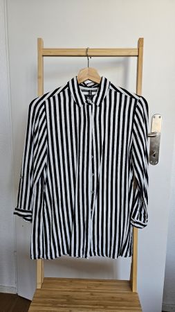 Female shirt with cropped sleeves. size S