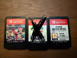 Lot Nintendo Switch, 2 joyeux, Mario Kart 8 Deluxe + Smash