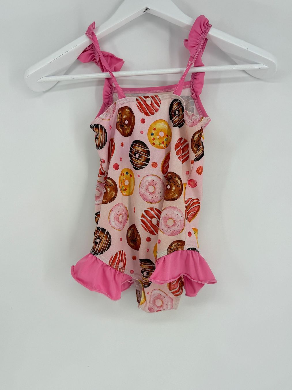 Badekleider & Bikinis: Badeanzug mit Donuts Gr. 120 – Gebraucht aus Auenstein von moin. 1