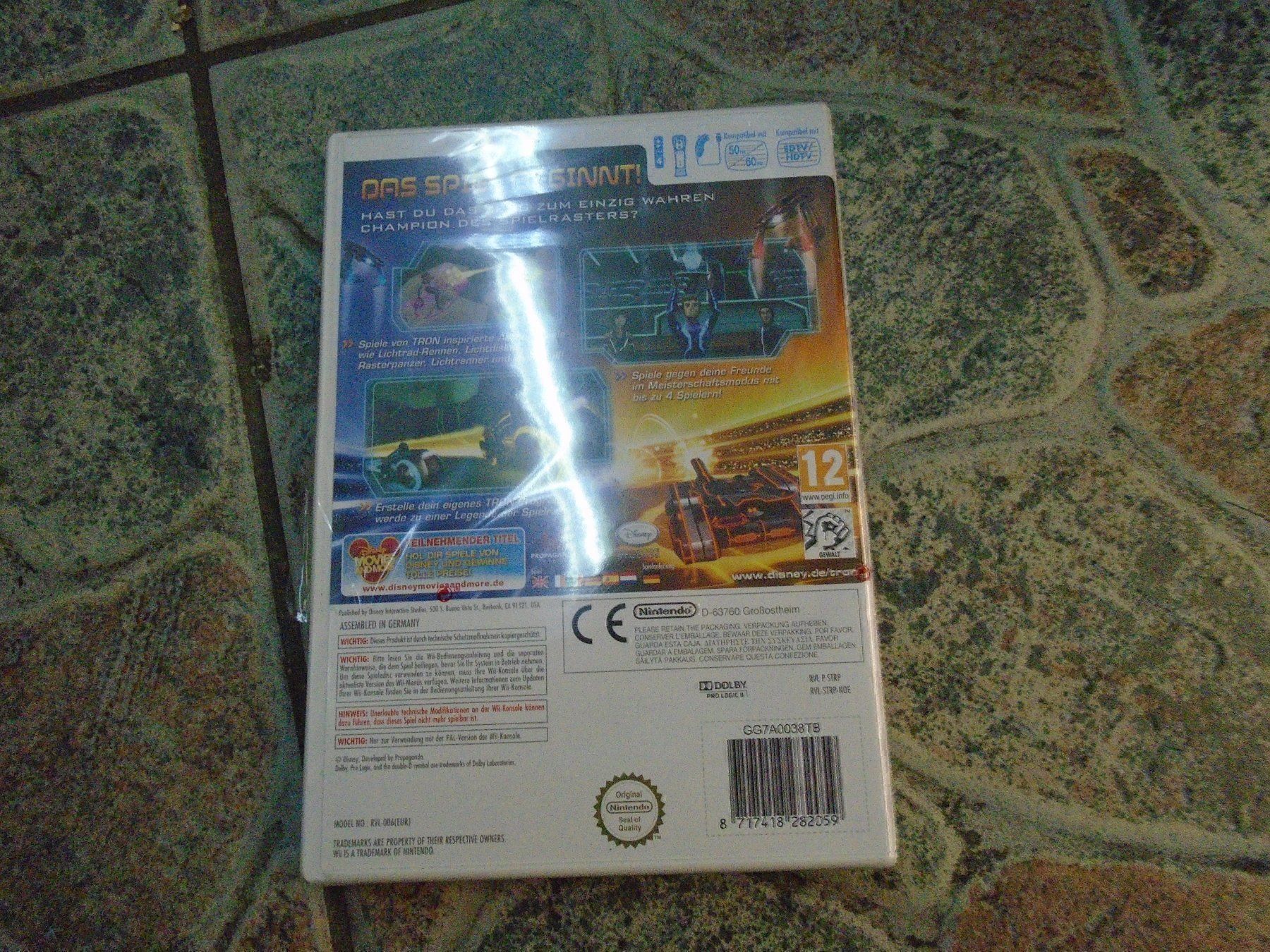 Giochi: Tron Revolution Battle Grids WII NEUWARE – Nuovo e nell'imballaggio originale da Olten venduto da Disc-Ausverkauf 1