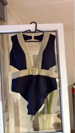Elegant Black Swimsuit with Golden Buckle - Summer Ready!