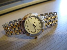 Nina Ricci Paris Swiss Made Damenuhr Quartz Stahl-Gold Läuft