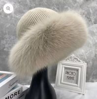 bonnet d'hiver neuf élégant avec fourrure naturelle