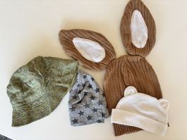 Set of 4 baby hats various designs good condition