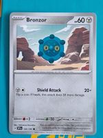 Bronzor - Pokemon Surging Sparks