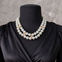 Collier double rangs perles blanches et strass dorés