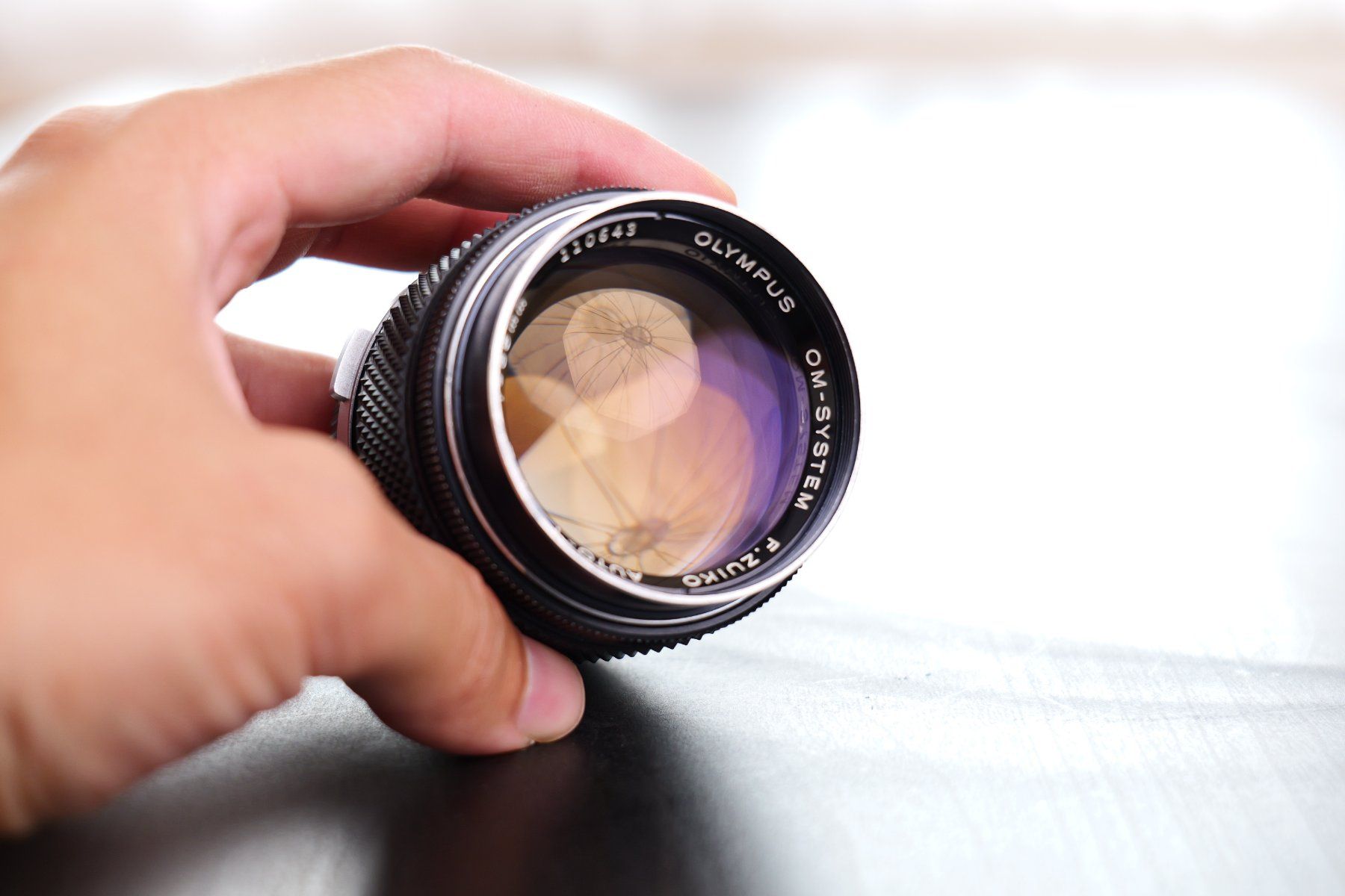 Olympus Objectifs: Olympus OM Zuiko 85mm f2 – D'occasion à Tecknau par LevinLaufmann