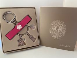Porte-clés Guerlain dans sa boîte