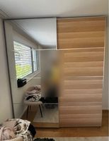 PAX Wardrobe — sliding doors, mirror + oak effect