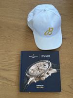 Breitling Cap weiss gelb mit Chronolog Buch gebraucht
