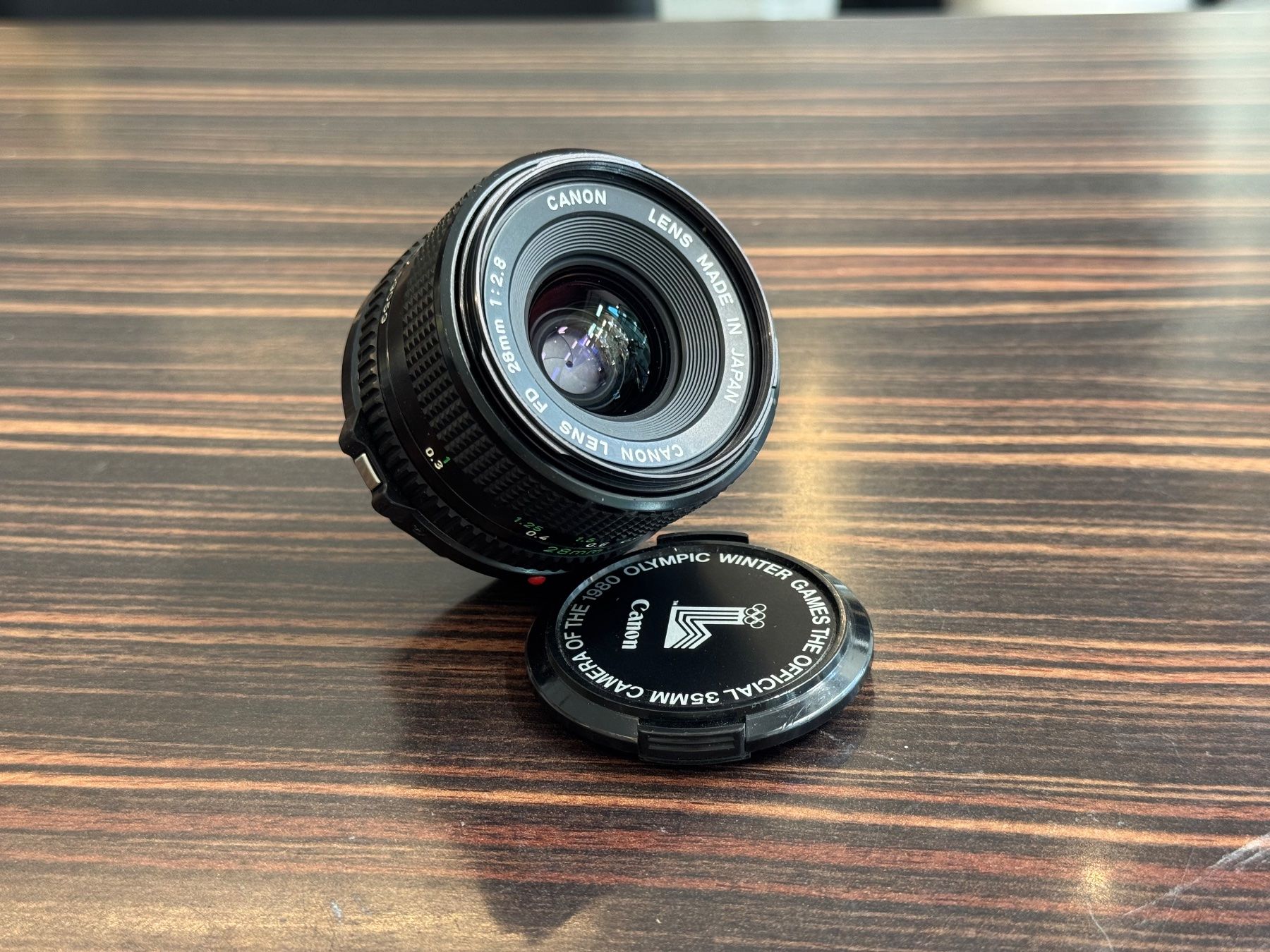 Canon Objectifs: Canon FD 28mm 1:2.8 Objektiv – D'occasion à Zürich par KochphotoAG