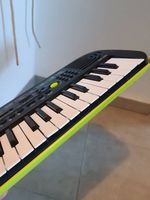 Petit piano à pile en super état 