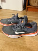 Nike Free, Laufschuhe in Grau/ Neon-orange