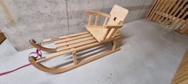 Wunderschöner Davoser Holzschlitten mit Kindersitz