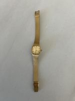 Montre femme Certina doré bracelet maille état usagé à 1.-