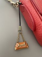 Gucci charm borsetta smaltata arancio, come nuovo!