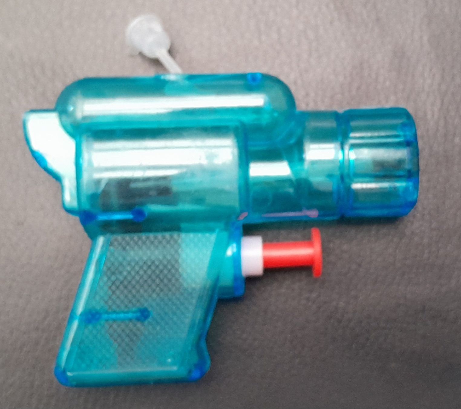 Giocattoli: Mini Wasserpistole Spielzeug diverse Farben – Usato da Zürich venduto da cole15 1