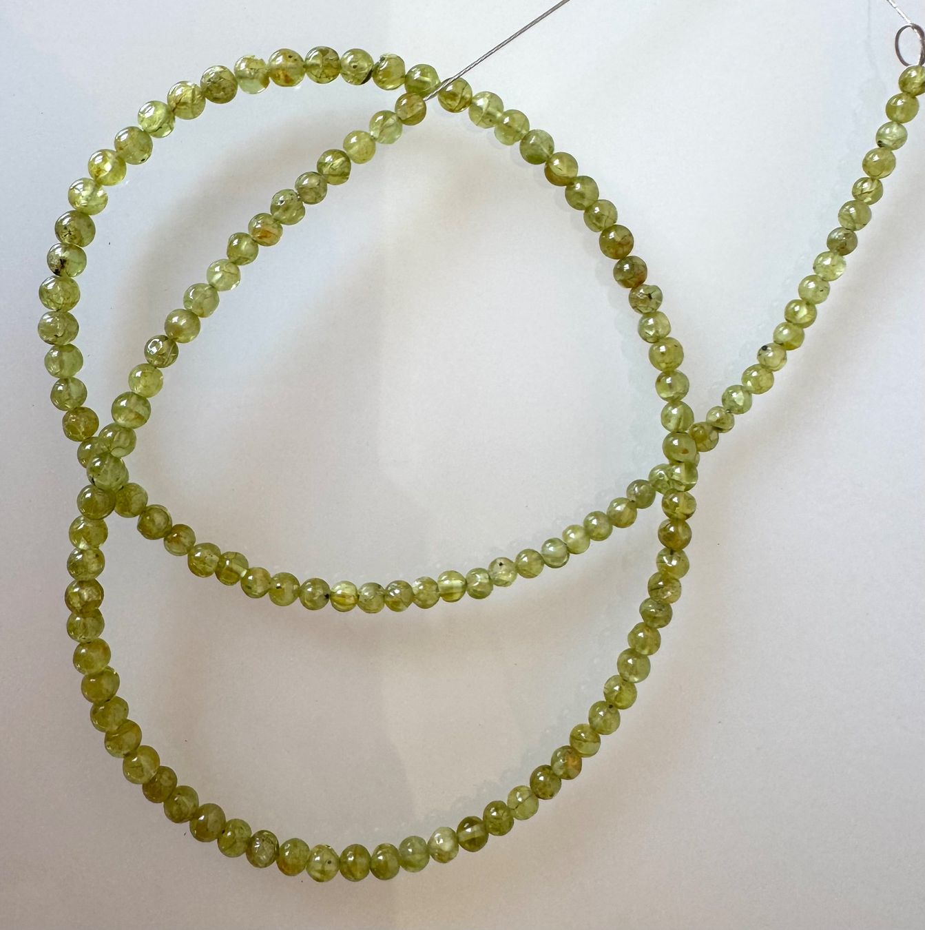 Ketten: Peridot. Olivin       runde Form    45cm  4mm – Neu und originalverpackt aus Leuggern von gemshow 4