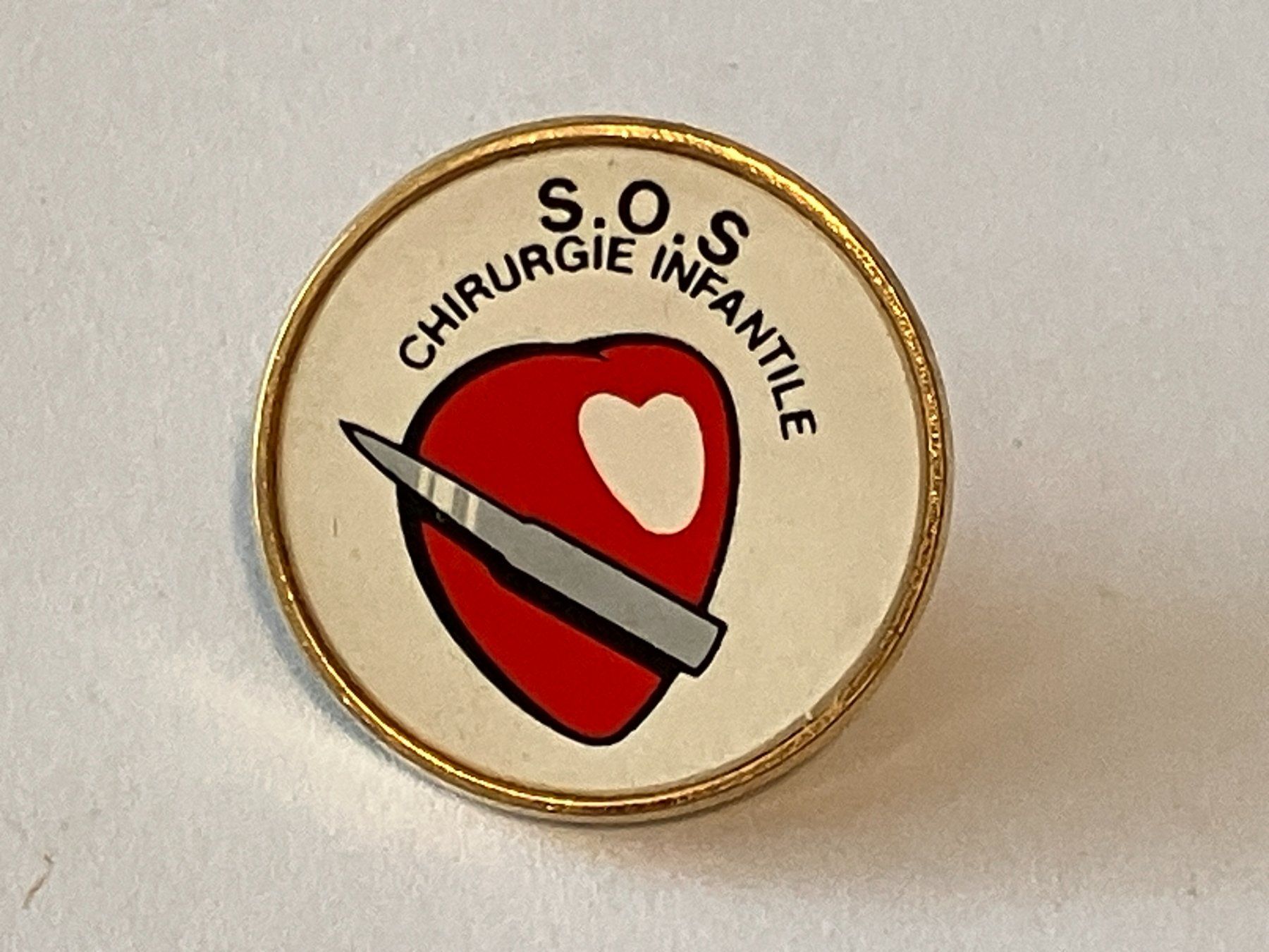 Placchette & Badge: 1 Pin SOS Chirurgie Infantile – Usato da Basel venduto da djwwpp
