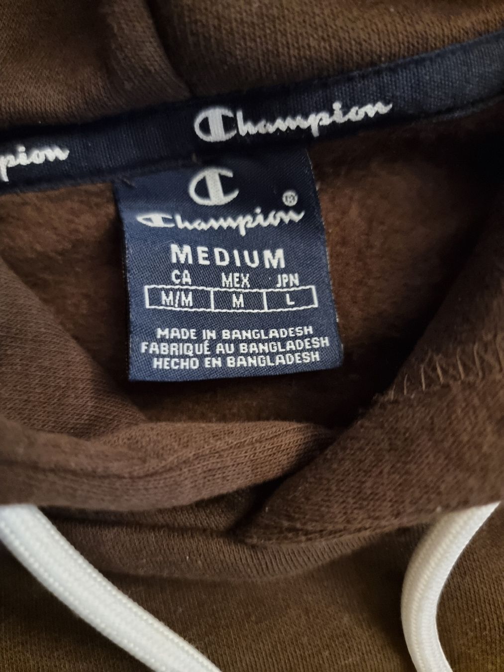 Champion Maglioni & Felpe: Sweat à capuche marron unisexe CHAMPION M – Usato da Veyrier venduto da Leilazizou 1