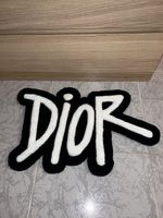 Tapis Dior noir et blanc - accessoire de luxe rare!