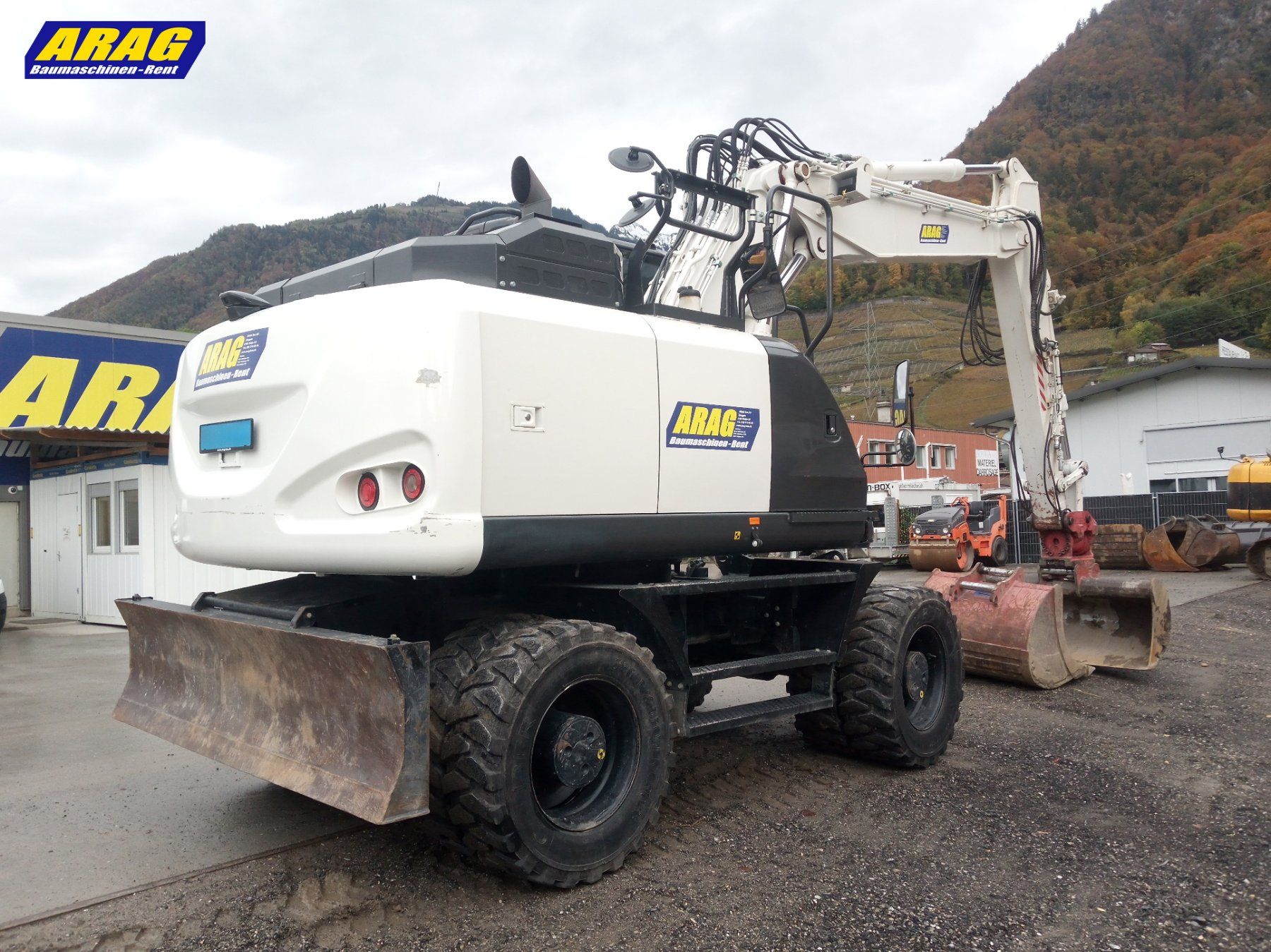 Hitachi Escavatori: Hitachi ZX 140 W-6 Pneubagger – Usato da Hasle LU venduto da Arag08 5