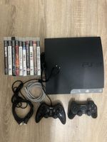 Console Sony PlayStation 3 avec jeux et manettes