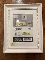 Cadre en bois blanc romantique