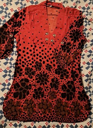 Stylish red tunic with black flowers, size S