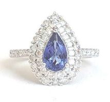 Juwelenring mit 1 Tansanit 0.83 ct. und 47 Diamanten, 3890.-
