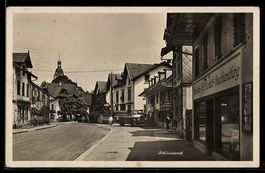 AK Schönenwerd, Strassenpartie mit Buchhandlung und Kirche